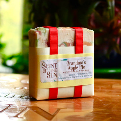 Grandma's Apple Pie vegan, handmade bar soaps, with writing noting that they feature kaolin clay, shea butter, and cocoa butter.